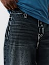 JEANS DE BARRIL CON COSTURA SUPER T