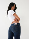 JEANS SKINNY CURVILÍNEOS JENNIE DE TIRO MEDIO
