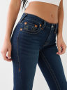 JEANS SKINNY CURVILÍNEOS JENNIE DE TIRO MEDIO