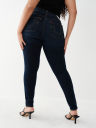 JEANS SKINNY CURVILÍNEOS JENNIE DE TIRO MEDIO