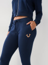 PANTALONES DEPORTIVOS CON LOGOTIPO