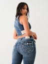 JEANS SKINNY CURVILÍNEOS JENNIE DE TIRO ALTO CON CRISTAL