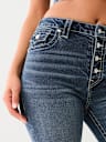 JEANS SKINNY CURVILÍNEOS JENNIE DE TIRO ALTO CON CRISTAL