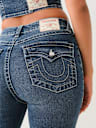 JEANS SKINNY CURVILÍNEOS JENNIE DE TIRO ALTO CON CRISTAL