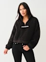 SUÉTER CON MEDIO CIERRE Y LOGOTIPO ESTILO SHERPA