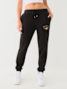 PANTALONES JOGGER CON DETALLES METÁLICOS Y CRISTALES