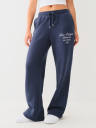 PANTALONES DEPORTIVOS TIPO UNIVERSITARIO CON PIERNAS RECTAS