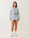 WASHED RAW EDGE BIG T MINI SKIRT