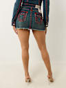 TWISTED SEAM SUPER T MINI SKIRT