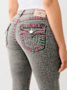 JEANS SKINNY CURVILÍNEOS JENNIE BIG T CON TIRO TORCIDO