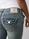 JEANS JOEY ACAMPANADOS DE TIRO BAJO CON SOLAPA