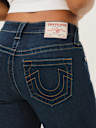 JEANS SKINNY CURVILÍNEOS JENNIE DE TIRO MEDIO