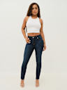JEANS SKINNY CURVILÍNEOS JENNIE DE TIRO MEDIO