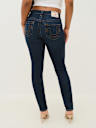 JEANS SKINNY CURVILÍNEOS JENNIE DE TIRO MEDIO