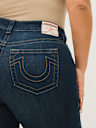 ADEMÁS JEANS SKINNY CURVILÍNEOS JENNIE DE TIRO ALTO