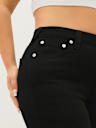 ADEMÁS JEANS SKINNY CURVILÍNEOS JENNIE DE TIRO ALTO