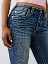 JENNIE MID RISE BUDDHA POCKET CURVY SKINNY JEAN