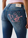 JENNIE MID RISE BUDDHA POCKET CURVY SKINNY JEAN
