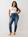 PLUS JENNIE MID RISE BUDDHA POCKET CURVY SKINNY JEAN