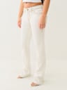 BECCA BIG T LUREX MID RISE BOOTCUT JEAN