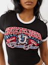 CAMISETA PEQUEÑA CON LOGOTIPO Y BORDE DE CRISTALES