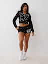 SHORTS DE FELPA DE LANILLA DE TIRO BAJO DESHILACHADOS