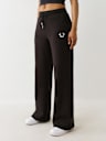 PANTALONES DEPORTIVOS CON PIERNA RECTA Y BUDDHA DE LÚREX