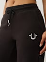 PANTALONES DEPORTIVOS CON PIERNA RECTA Y BUDDHA DE LÚREX