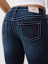 BECCA MID RISE BIG T BOOTCUT JEAN
