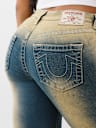 JEANS ACAMPANADOS Y FRUNCIDOS DE TIRO MEDIO
