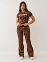 PANTALONES ACAMPANADOS DE LEOPARDO DE TIRO MEDIO BIG T DE CRISTAL