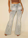 TRUE RELIGION X BELLA DOÑA MID RISE CUT OUT FLARE JEAN