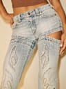 TRUE RELIGION X BELLA DOÑA MID RISE CUT OUT FLARE JEAN