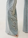 TRUE RELIGION X BELLA DOÑA MID RISE CUT OUT FLARE JEAN