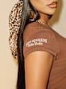 TRUE RELIGION X BELLA DOÑA CRYSTAL BUENA SUERTE BABY TEE