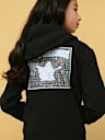 SUDADERA CON CAPUCHA, CIERRE Y EL LOGOTIPO DE WORLD TOUR CON GLITTER PARA NIÑA