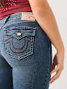JENNIE MID RISE FLAP SKINNY JEAN
