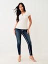 JEANS SKINNY CURVILÍNEOS JENNIE BIG T DE TIRO MEDIO