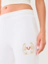 METALLIC WING HORSESHOE STRAIGHT LEG SWEAT PANT