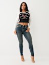 JEANS JENNIE SKINNY CURVILÍNEOS DE TIRO MEDIO BIG T