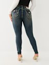 JEANS JENNIE SKINNY CURVILÍNEOS DE TIRO MEDIO BIG T