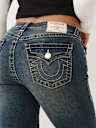 JEANS JENNIE SKINNY CURVILÍNEOS DE TIRO MEDIO BIG T