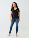 JEANS JENNIE SKINNY CURVILÍNEOS DE TIRO MEDIO BIG T