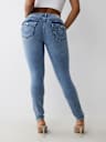 JEANS SKINNY CURVILÍNEOS JENNIE DE TIRO MEDIO