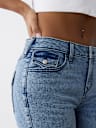 JEANS SKINNY CURVILÍNEOS JENNIE DE TIRO MEDIO