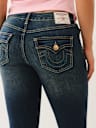 JENNIE MID RISE FLAP CURVY SKINNY JEAN