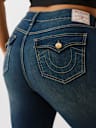 PLUS JENNIE MID RISE FLAP CURVY SKINNY JEAN