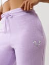 PANTALONES DEPORTIVOS CON PIERNAS RECTAS Y HERRADURA EN CRISTAL
