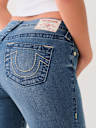 JENNIE MID RISE BIG T SKINNY JEAN