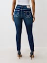 JENNIE MID RISE DISTRESSED CURVY SKINNY JEAN